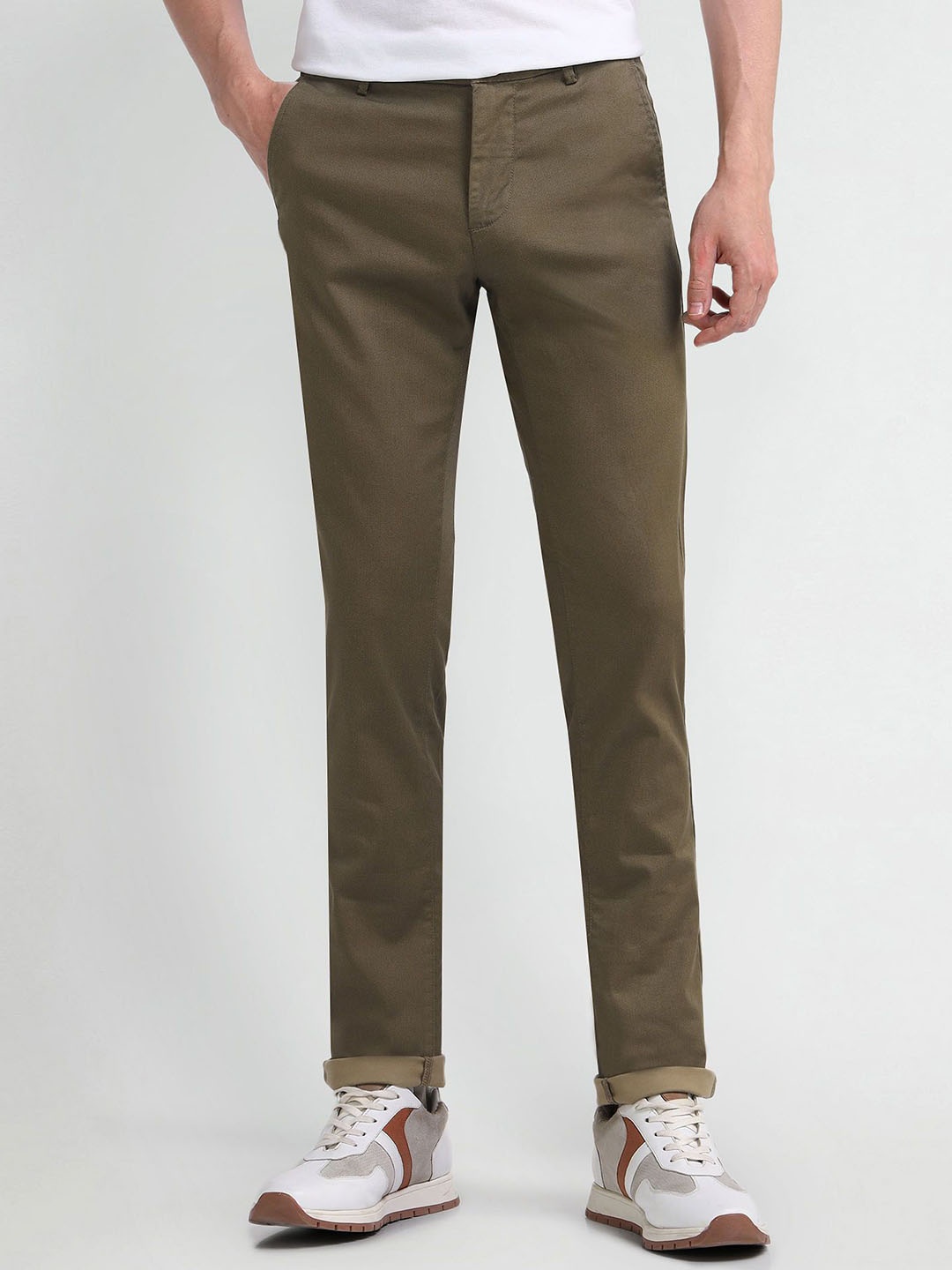 

Arrow Sport Men Solid Urban Slim Mid-Rise Slim Fit Trousers, Green