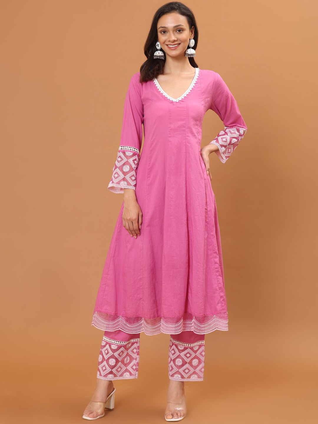 

Meena Bazaar Thread Work Cotton A-Line Kurta With Trouser, Magenta