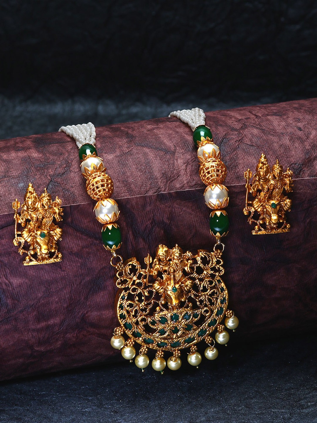 

ANIKAS CREATION Gold-Plated Gauri Shankar Stones-Studded & Beaded Temple Jewellery Set.