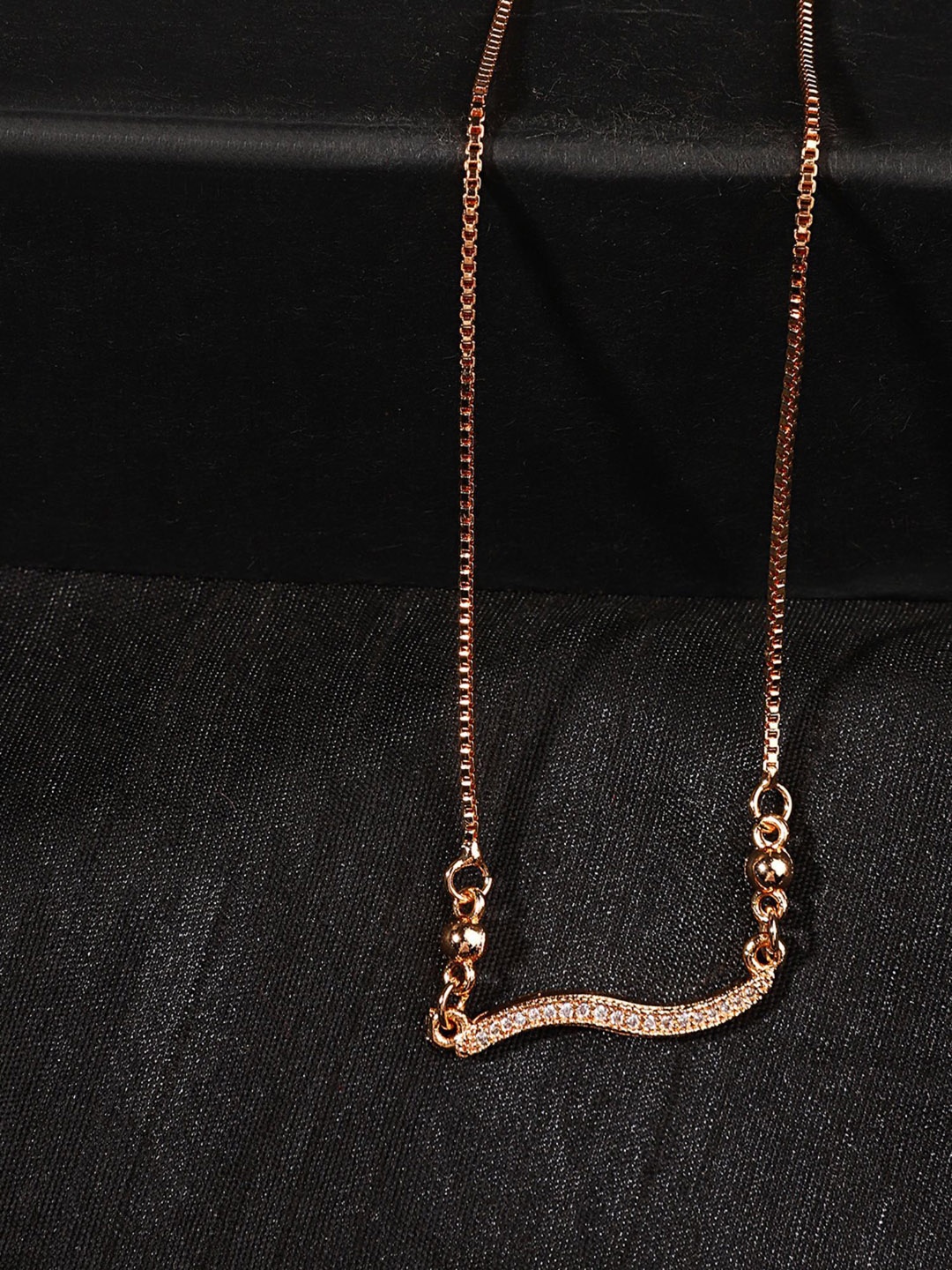 

ANIKAS CREATION Gold-Plated Brass Artificial Stones Designer Mangalsutra