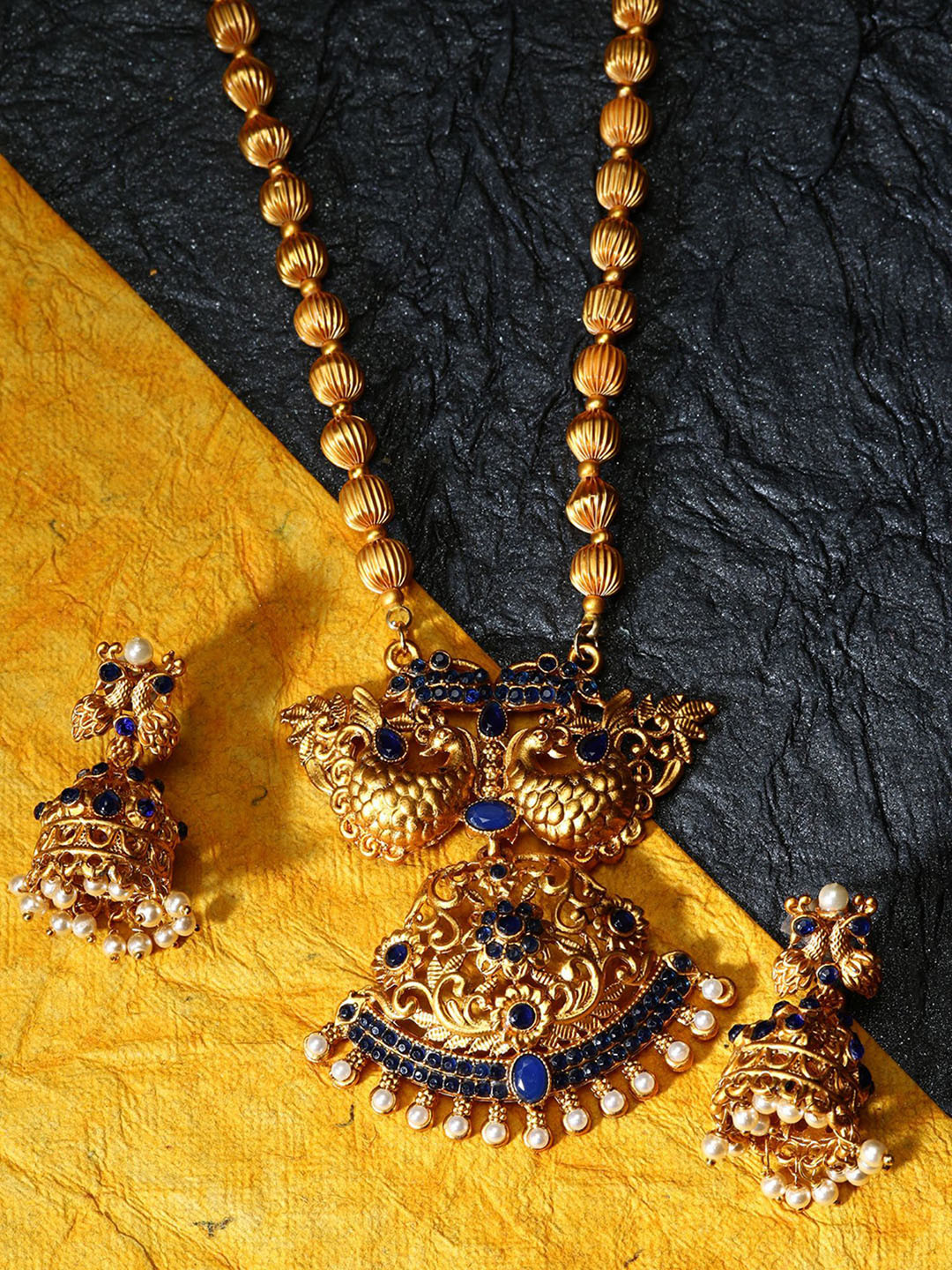 

ANIKAS CREATION Gold-Plated Stones-Studded & Beaded Peacock Shape Jewellery Set