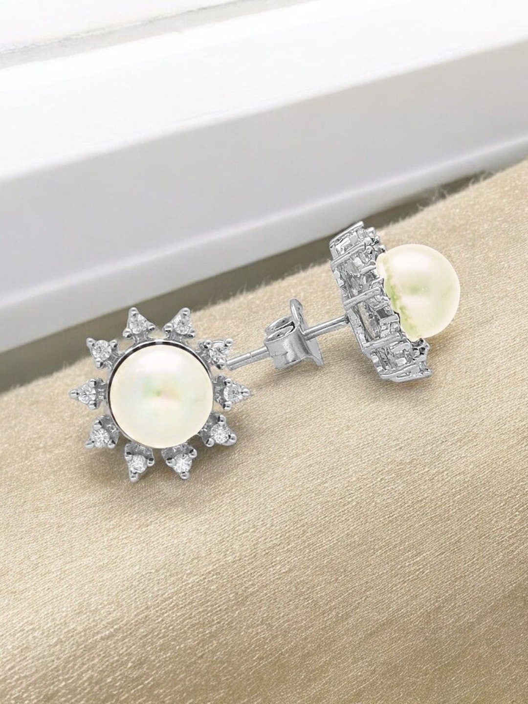 

Sri Jagdamba Pearls Dealer 925 Sterling Silver Stones Studded & Pearl Circular Studs