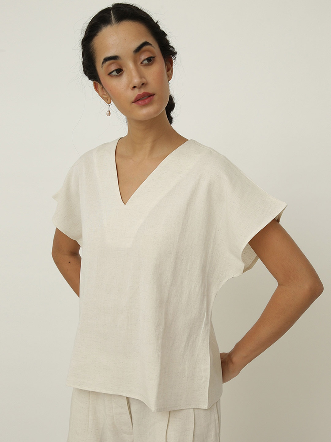

Saltpetre Women Solid V-Neck Top, Cream