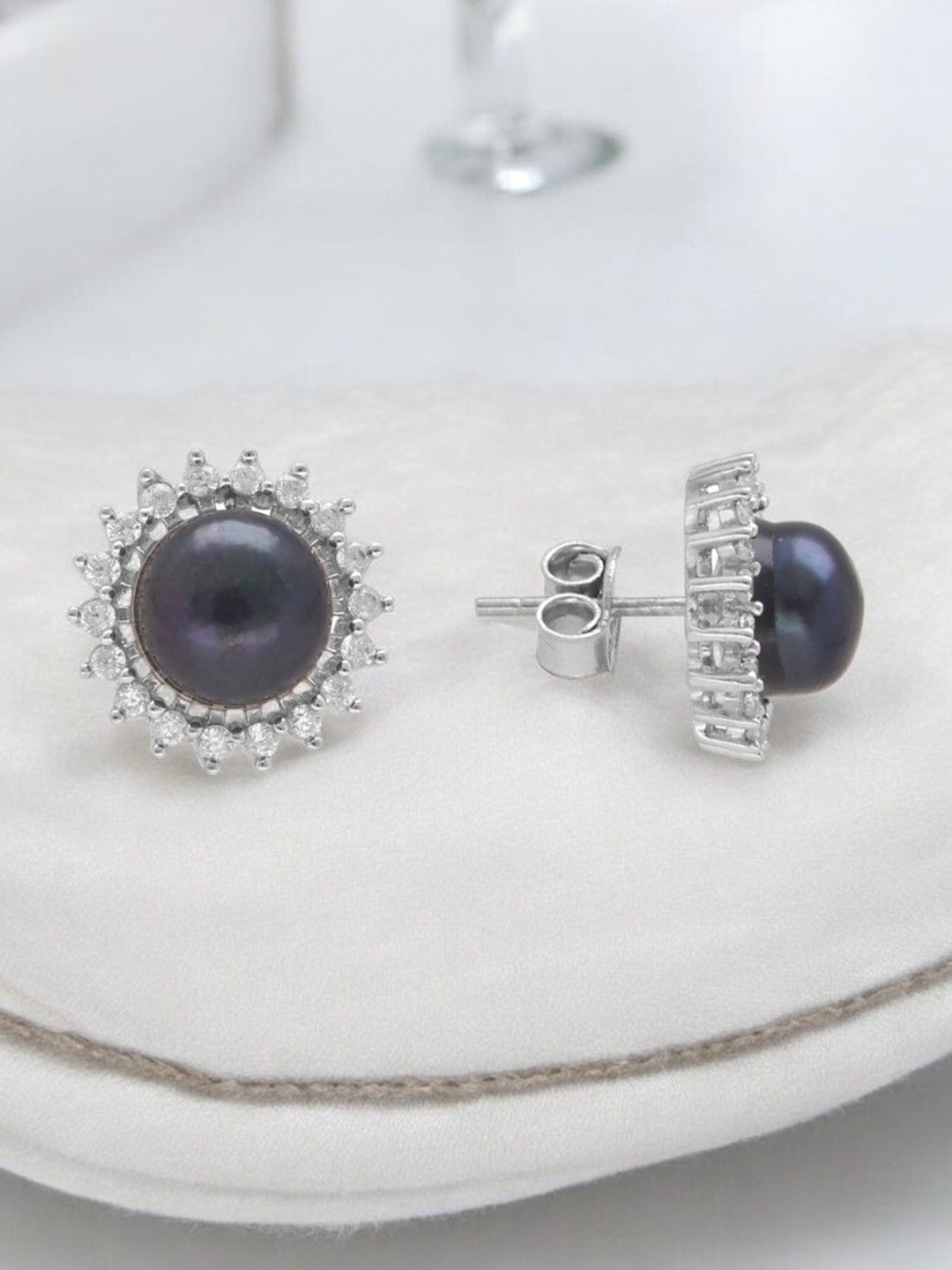

Sri Jagdamba Pearls Dealer 925 Sterling Silver Stones Studded & Pearl Circular Studs