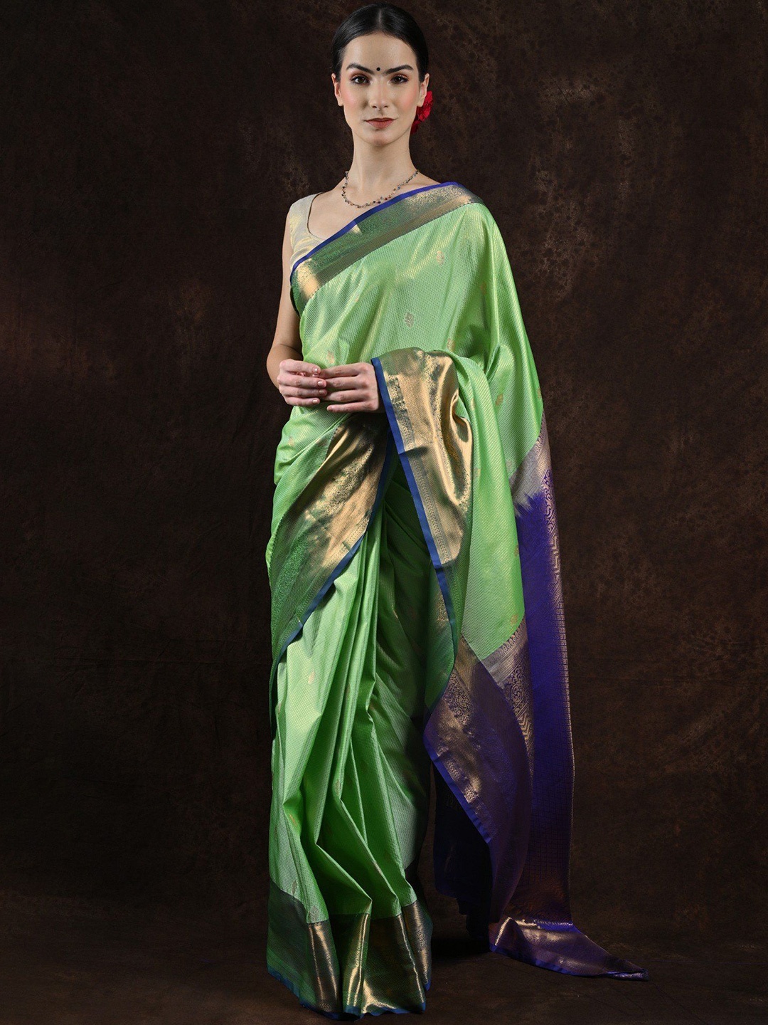 

Exotic India Zari Woven Stripes Art Silk Pastel Green Kanjivaram Saree