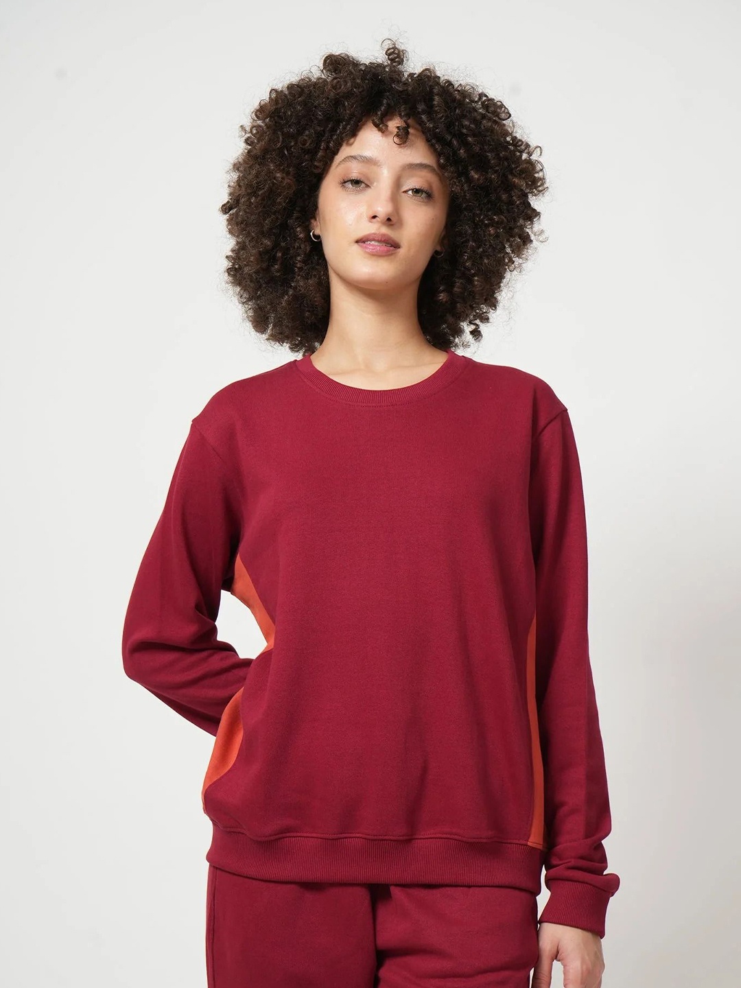 

Saltpetre Women Solid Round Neck Sweatshirt, Maroon