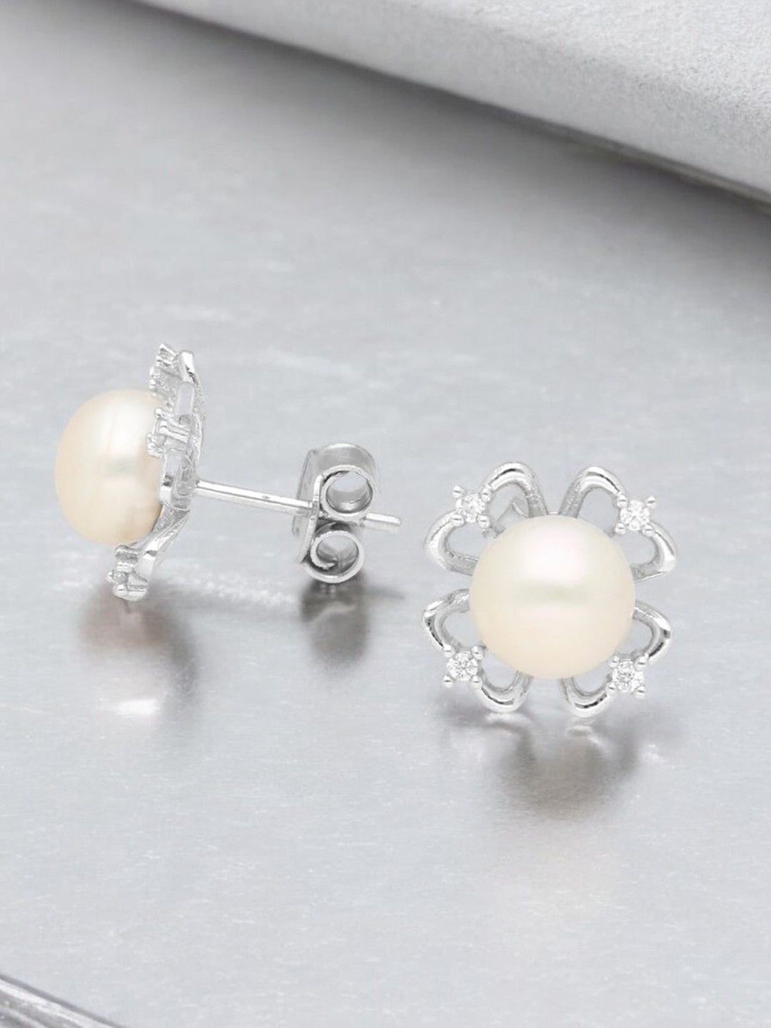 

Sri Jagdamba Pearls Dealer 925 Sterling Silver Stones Studded & Pearl Circular Studs, White