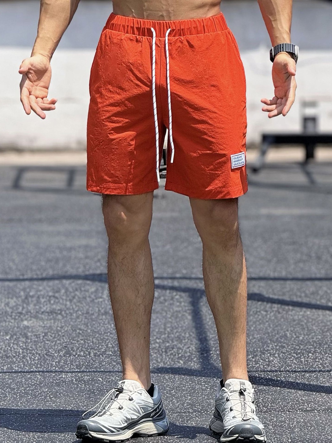 

StyleCast x Revolte Men Regular Fit Mid-Rise Shorts, Orange