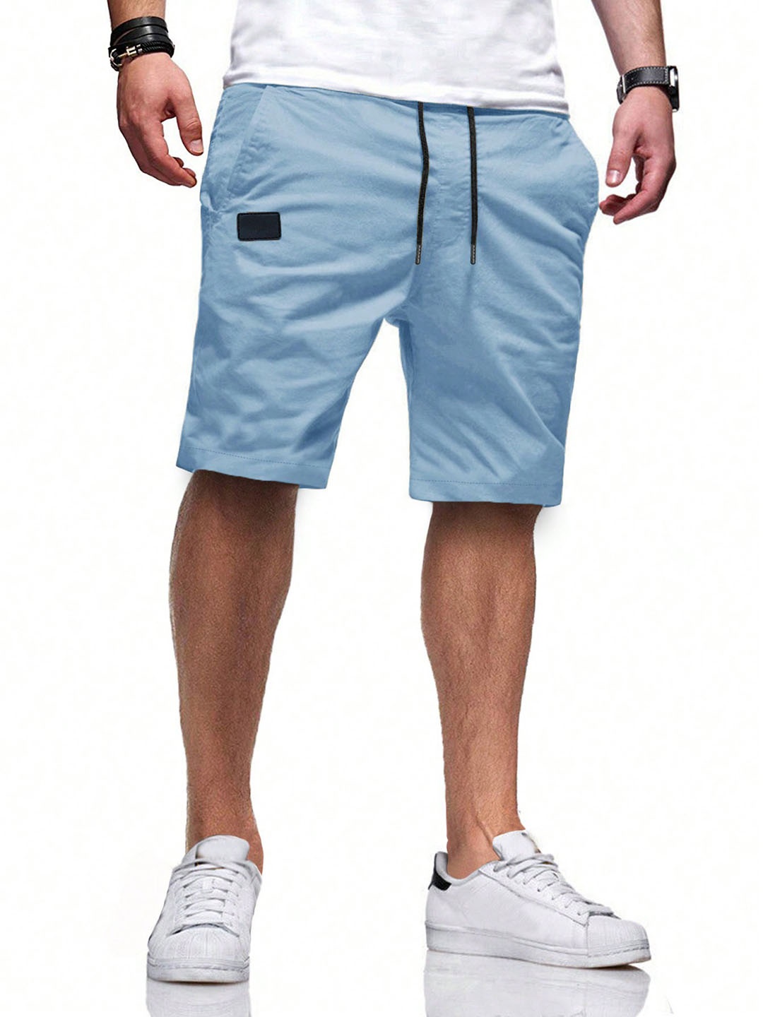 

StyleCast x Revolte Men Solid Mid-Rise Regular Shorts, Blue