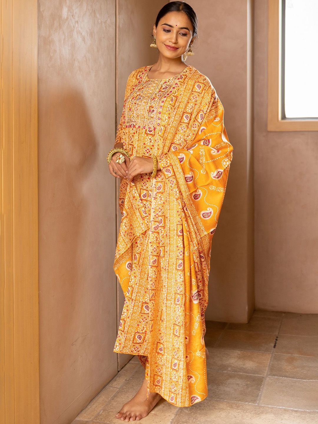 

KALINI Ethnic Motifs Printed Straight Kurta With Trousers & Dupatta, Orange