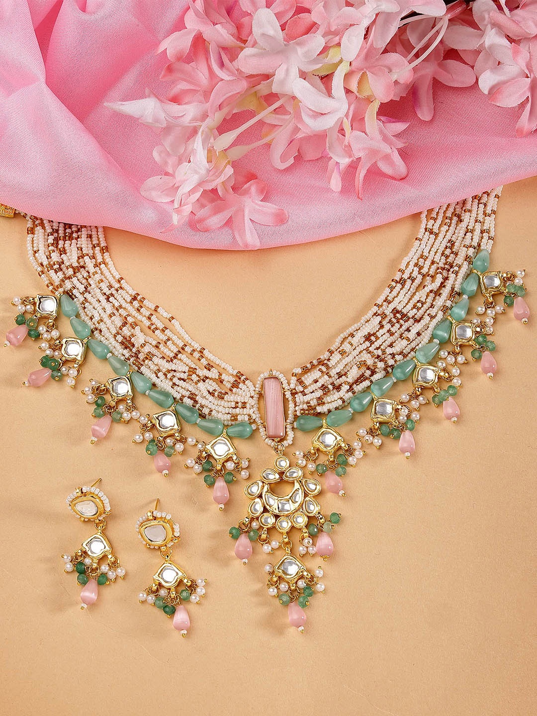 

KARATCART Gold-Plated Polki Kundan White Beaded Stone-Studded Choker Jewellery Set