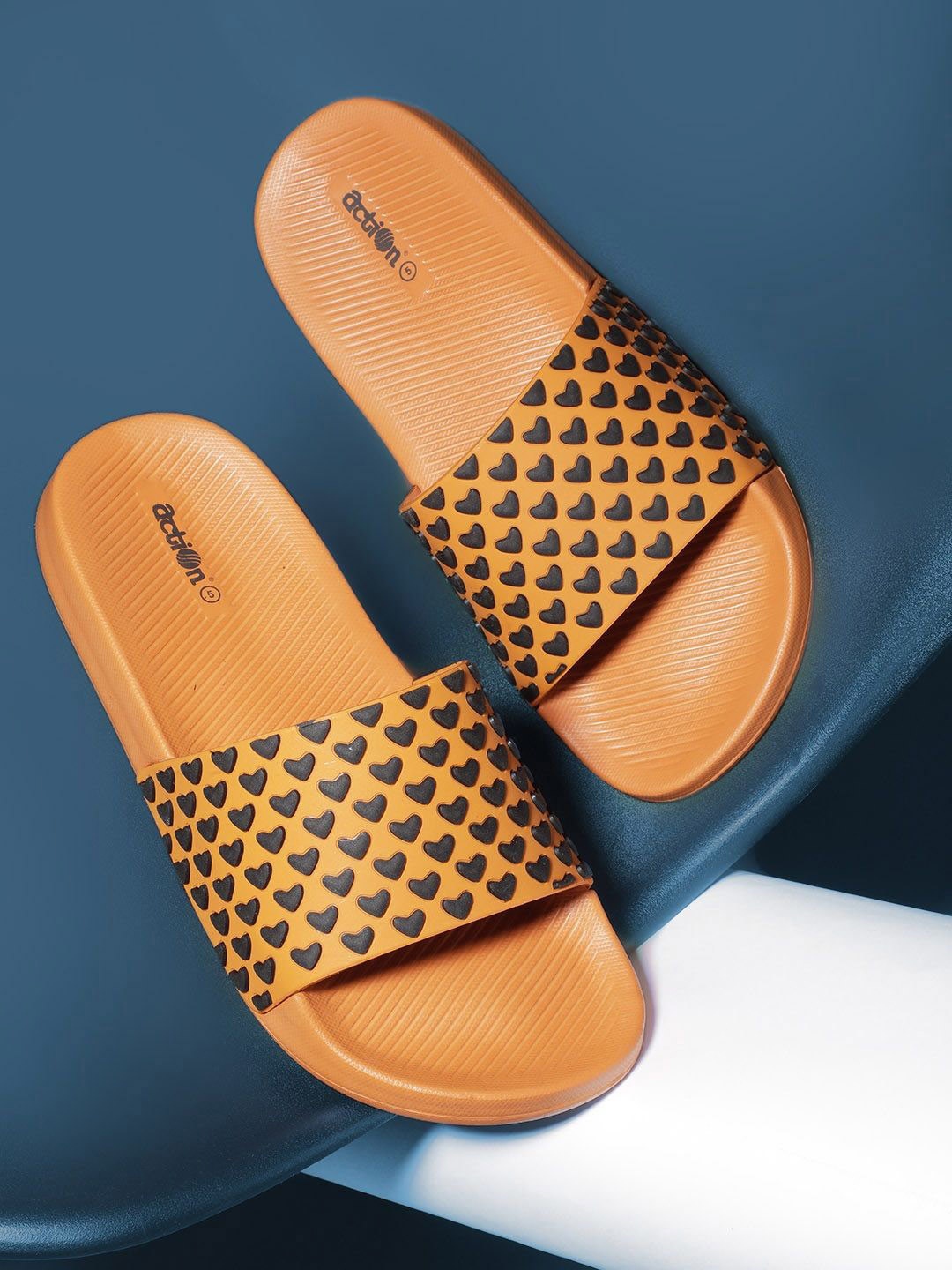 

Action EVA Flotter Women Self Design Rubber Sliders, Orange