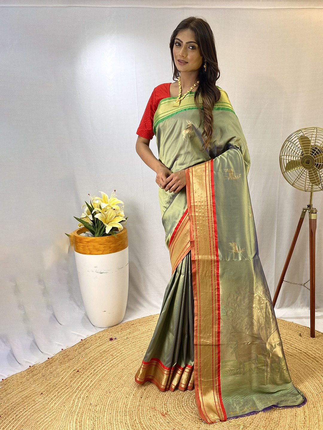 

DEVATITHI Ethnic Motifs Zari Saree, Lime green