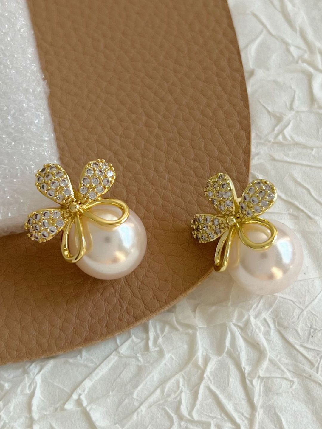 

VAGHBHATT Gold Plated Pearl Studded Floral Studs Earrings