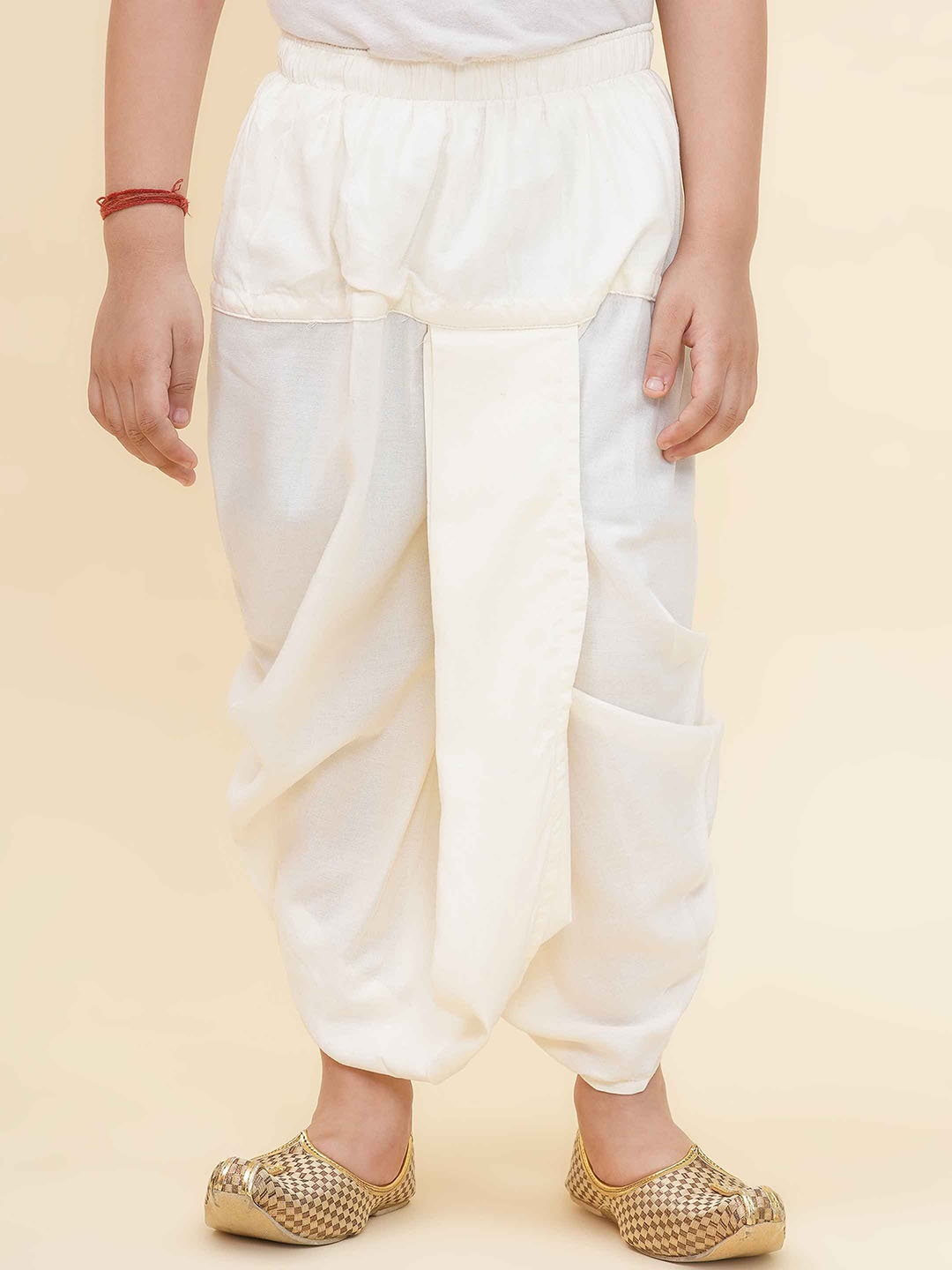 

Sethukrishna Boys Solid Slip-On Dhoti Pant, Cream