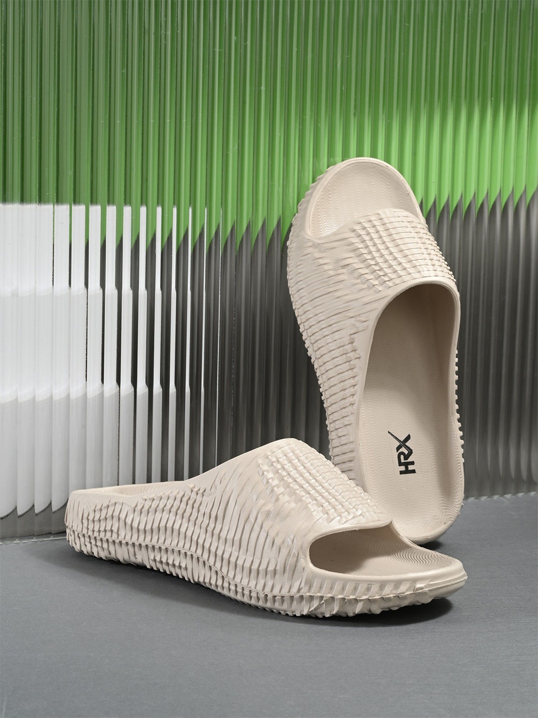 

HRX by Hrithik Roshan Men Self Design Rubber Sliders, Beige