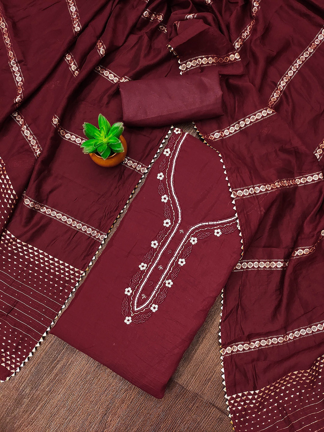 

Maroosh Floral Embroidered Beads and Stones Unstitched Dress Material, Maroon