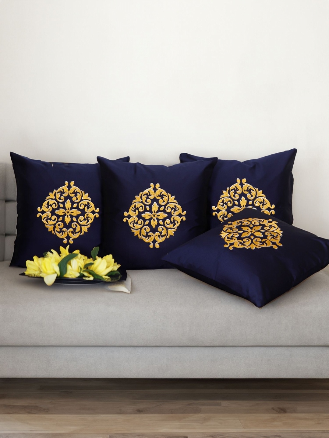 

ZEBA Blue & Gold Toned 4 Pieces Ethnic Motifs Embroidered Square Cushion Covers