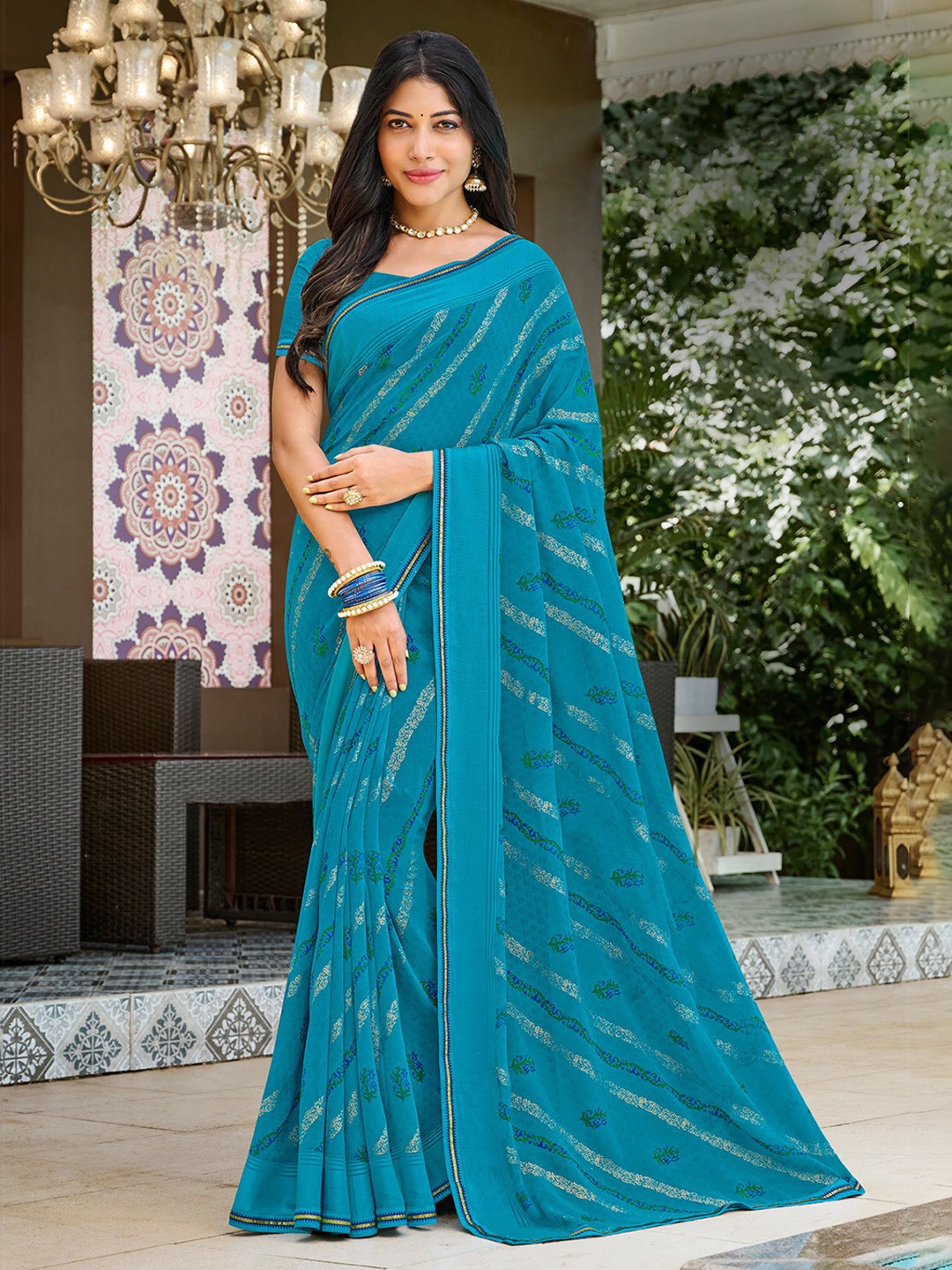 

Laxmipati Striped Embroidered Poly Chiffon Saree, Blue