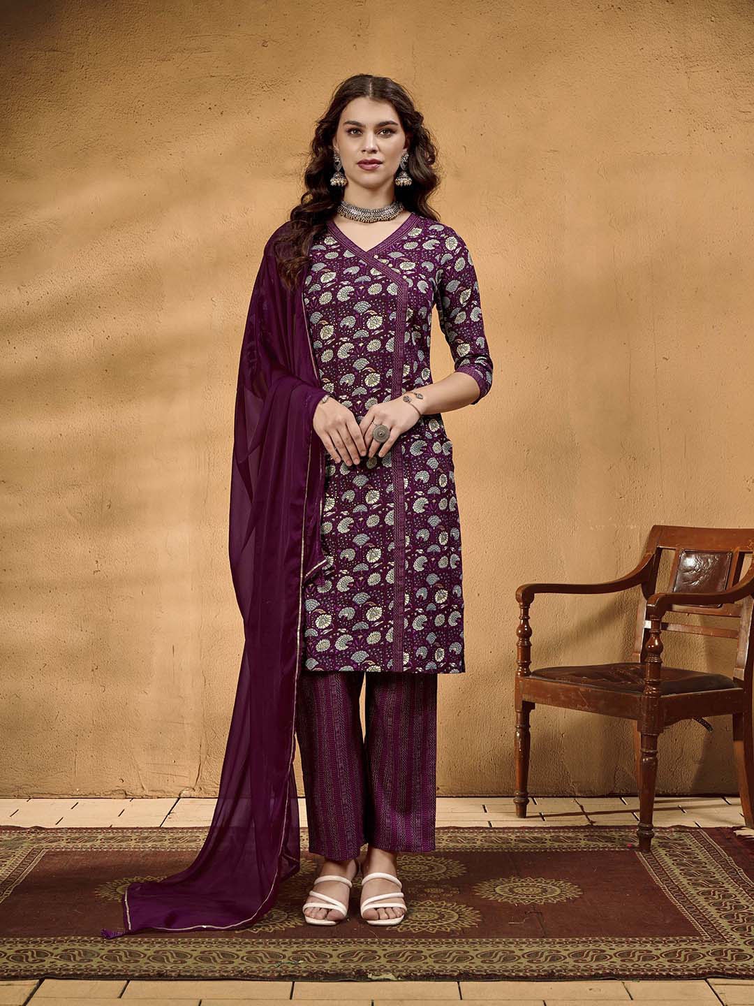 

Anouk Floral Printed Thread Work V-Neck Straight Kurta With Trouser & Dupatta, Magenta