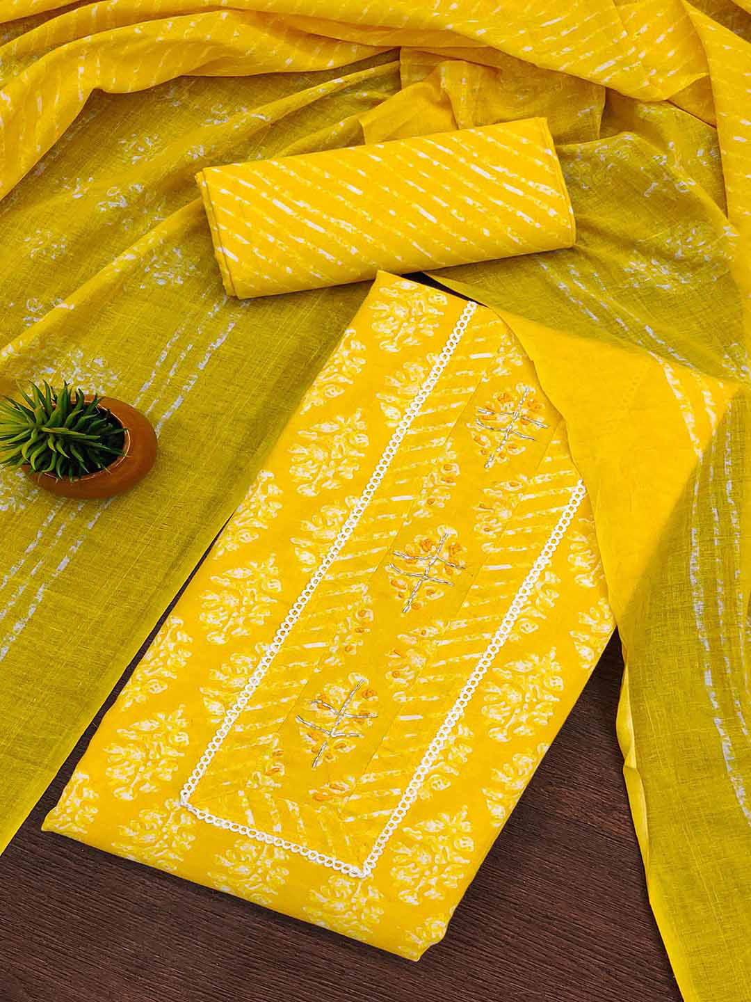 

Peachmode Women Printed Pure Cotton Unstitched Dress Material, Yellow