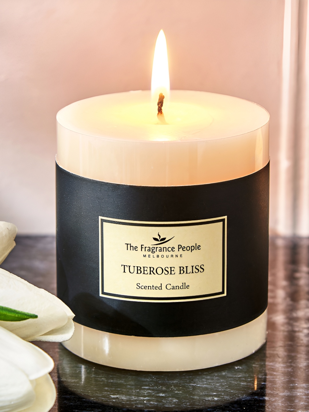 

Home Centre Boutique White and Black Tuberose Bliss Votive Pillar Candle