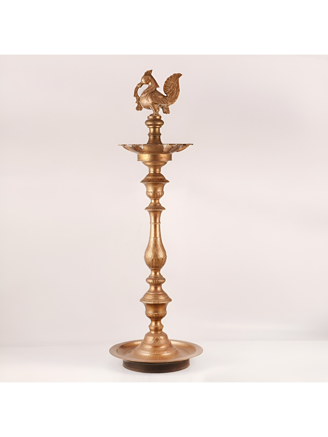 

Indianshelf Textured Peacock Standing Diya, Gold