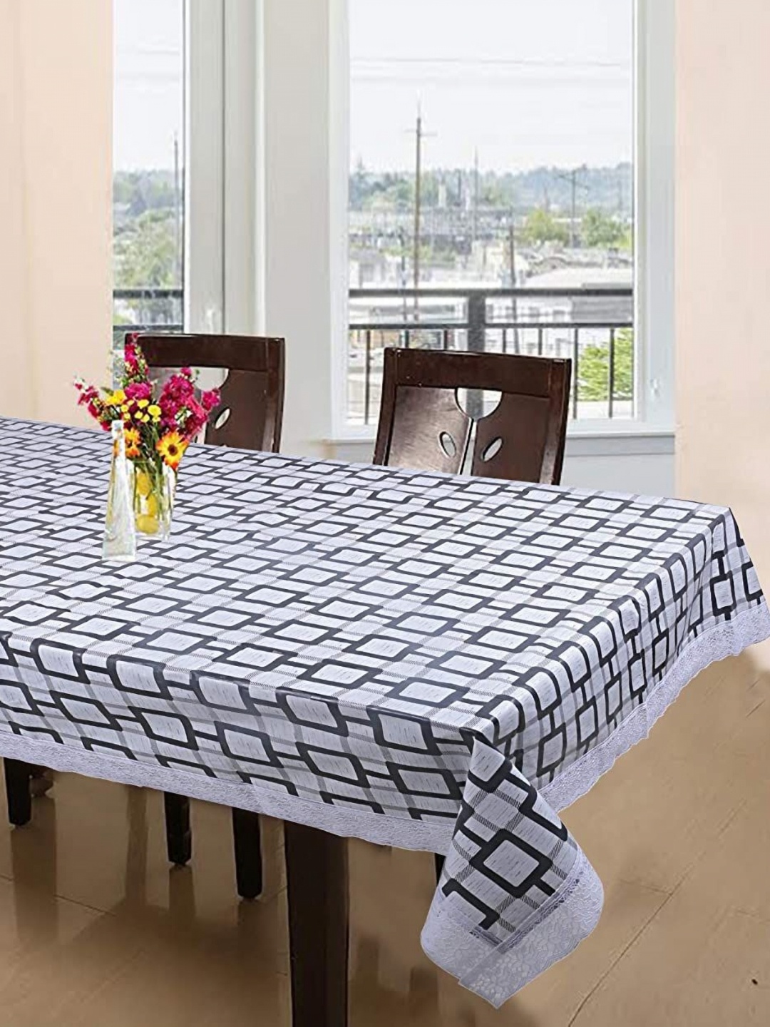 

LooMantha White Geometric Printed Waterproof Plastic 6-Seater Table Cover