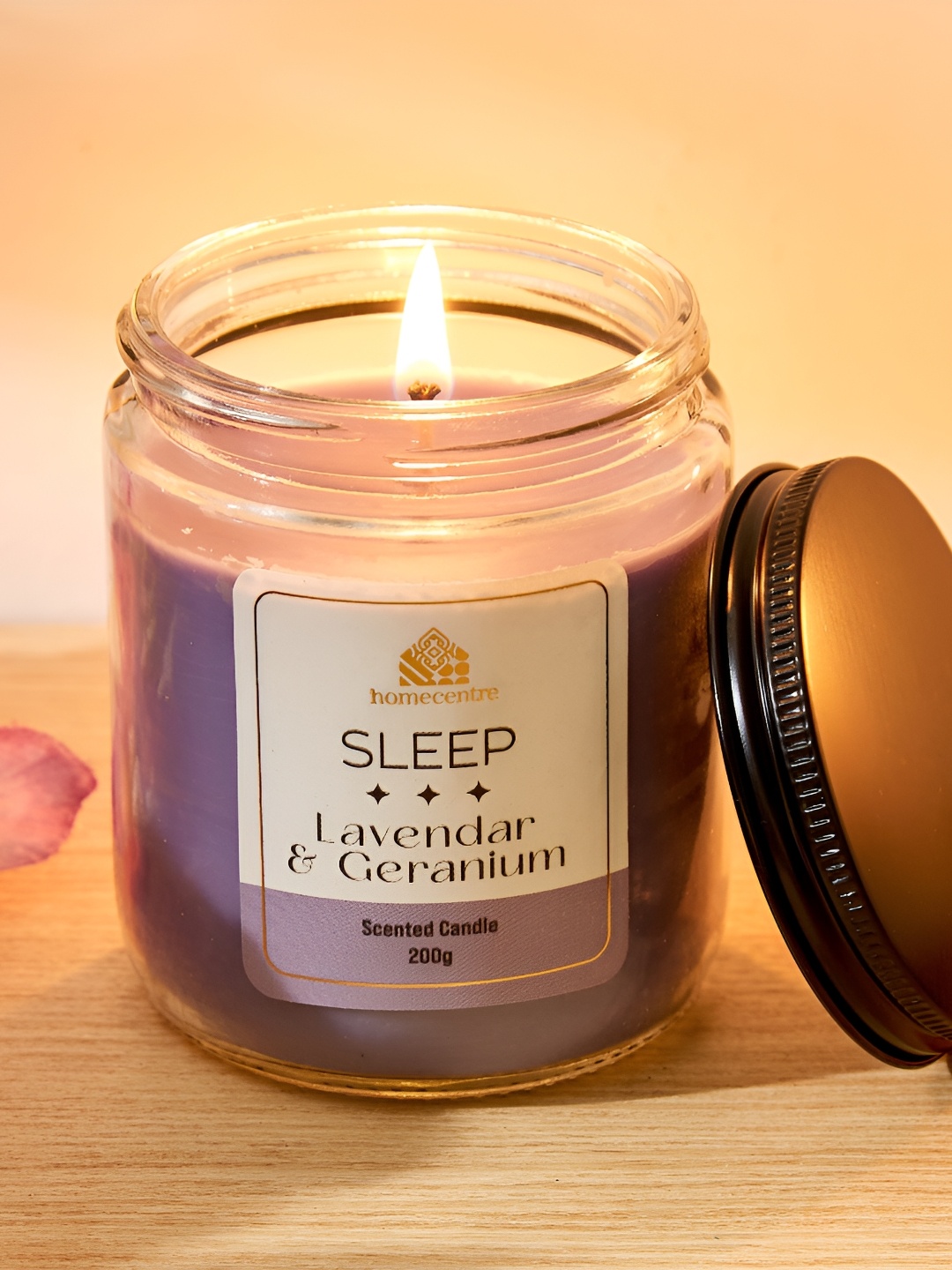 

Home Centre Adora Purple Printed Lavender and Geranium Scented Jar Candle