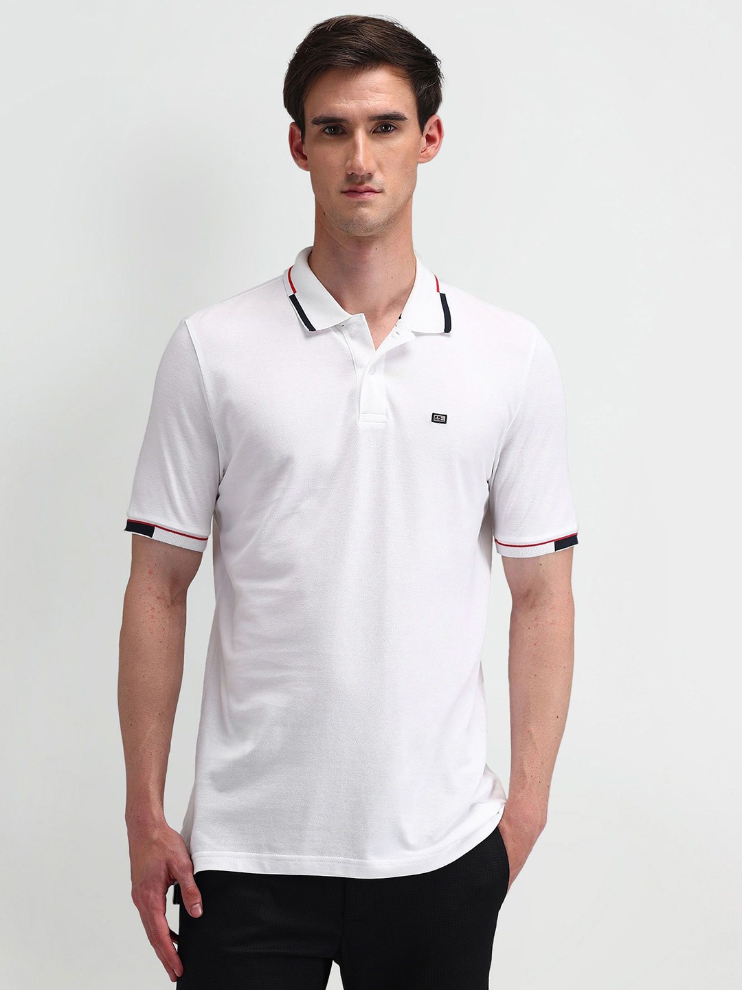 

Arrow Sport Men Solid Polo Collar Cotton T-shirt, White