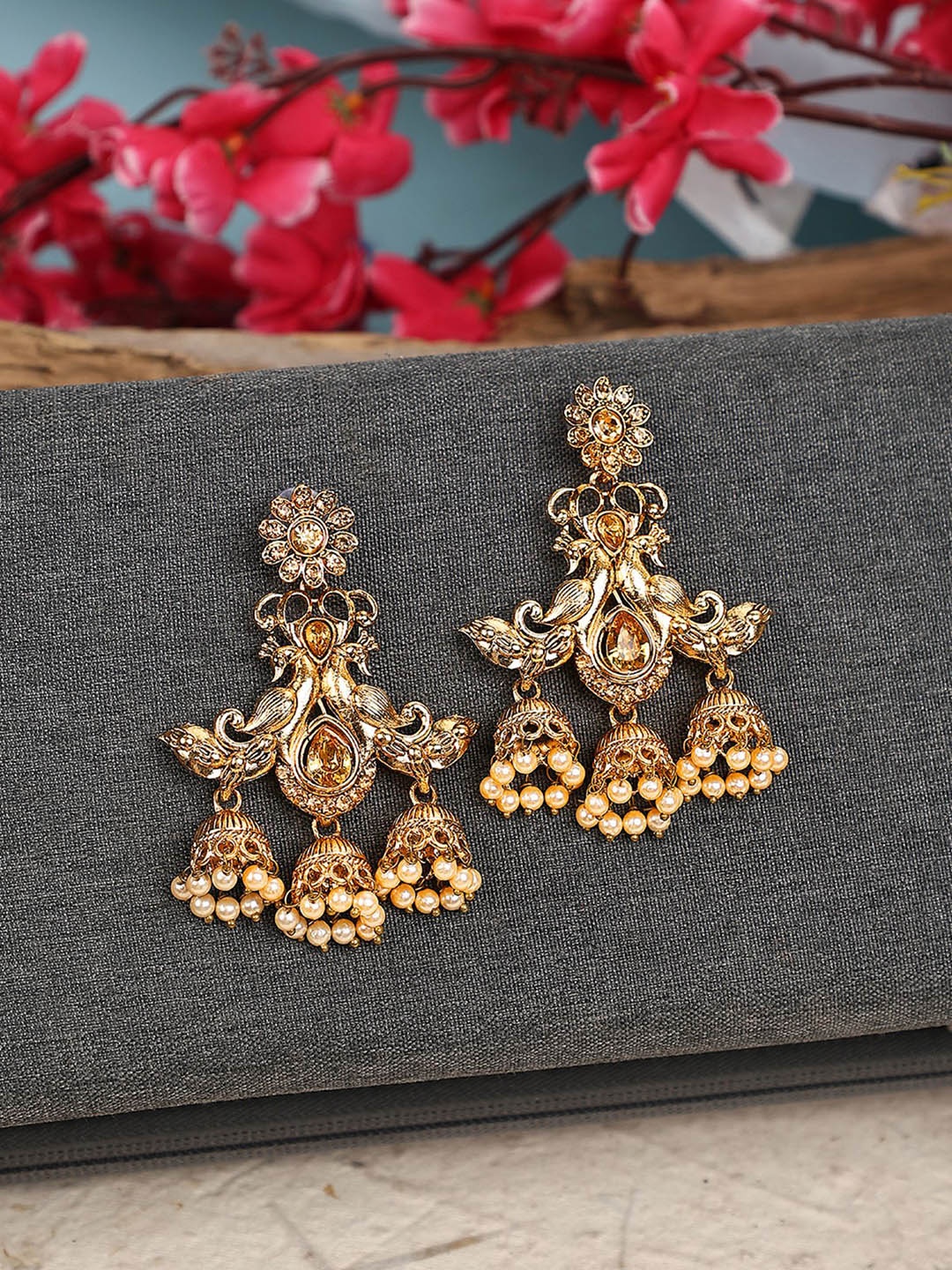 

ANIKAS CREATION Gold-Plated Cubic Zirconia Studded Peacock Shaped Drop Earrings