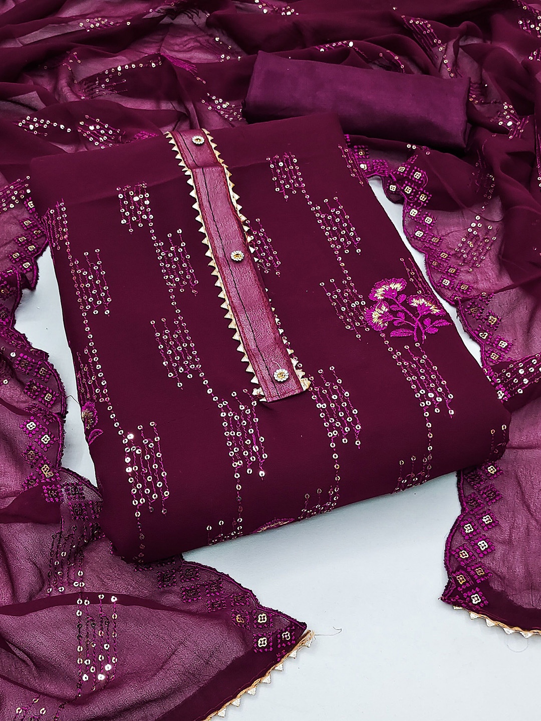 

Ishin Striped Embroidered Sequinned Detail Silk Georgette Unstitched Dress Material, Magenta