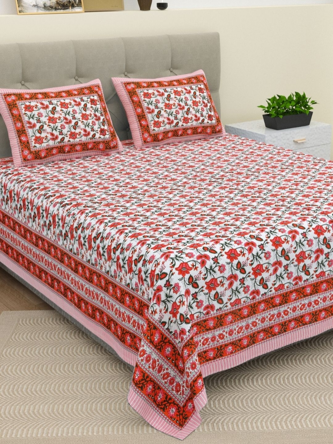 

The Craft Monk Red & White Floral Printed 210 TC Cotton King Bedsheet with 2 Pillow Covers