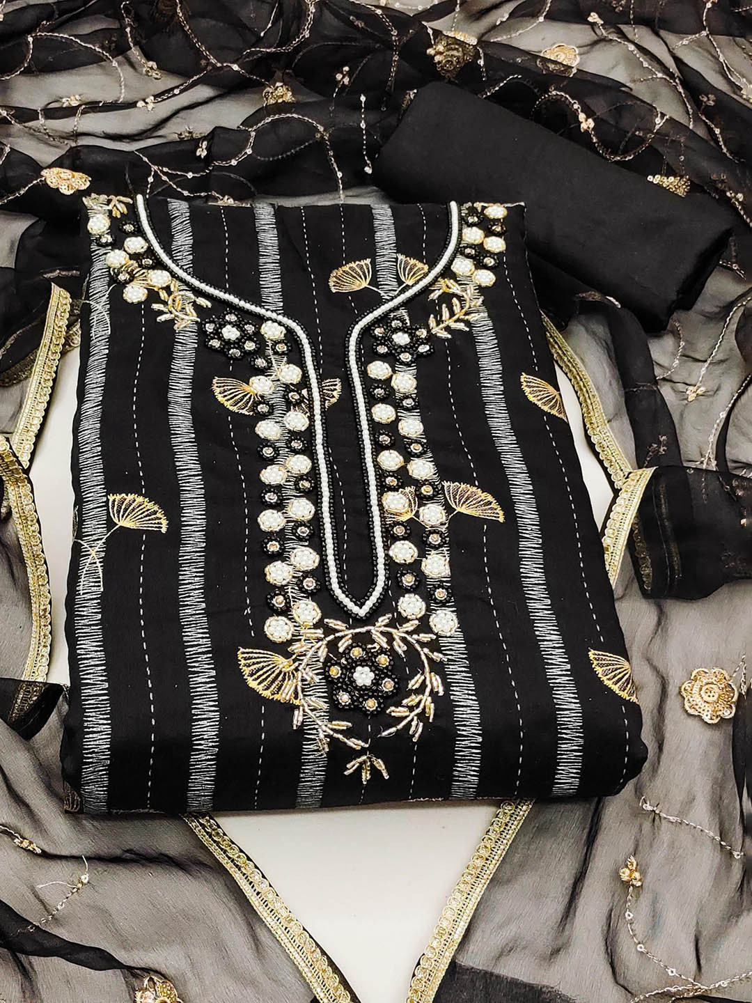 

Ishin Black & Gold-Toned Striped Unstitched Dress Material