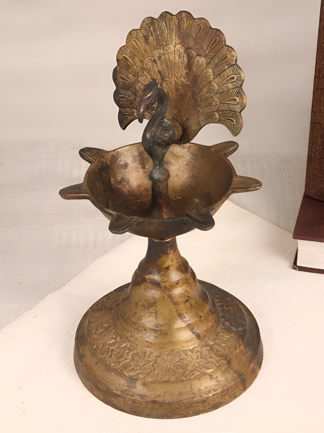 

Indianshelf Bronze and Black Textured Brass Diwali Peacock Diya Deep