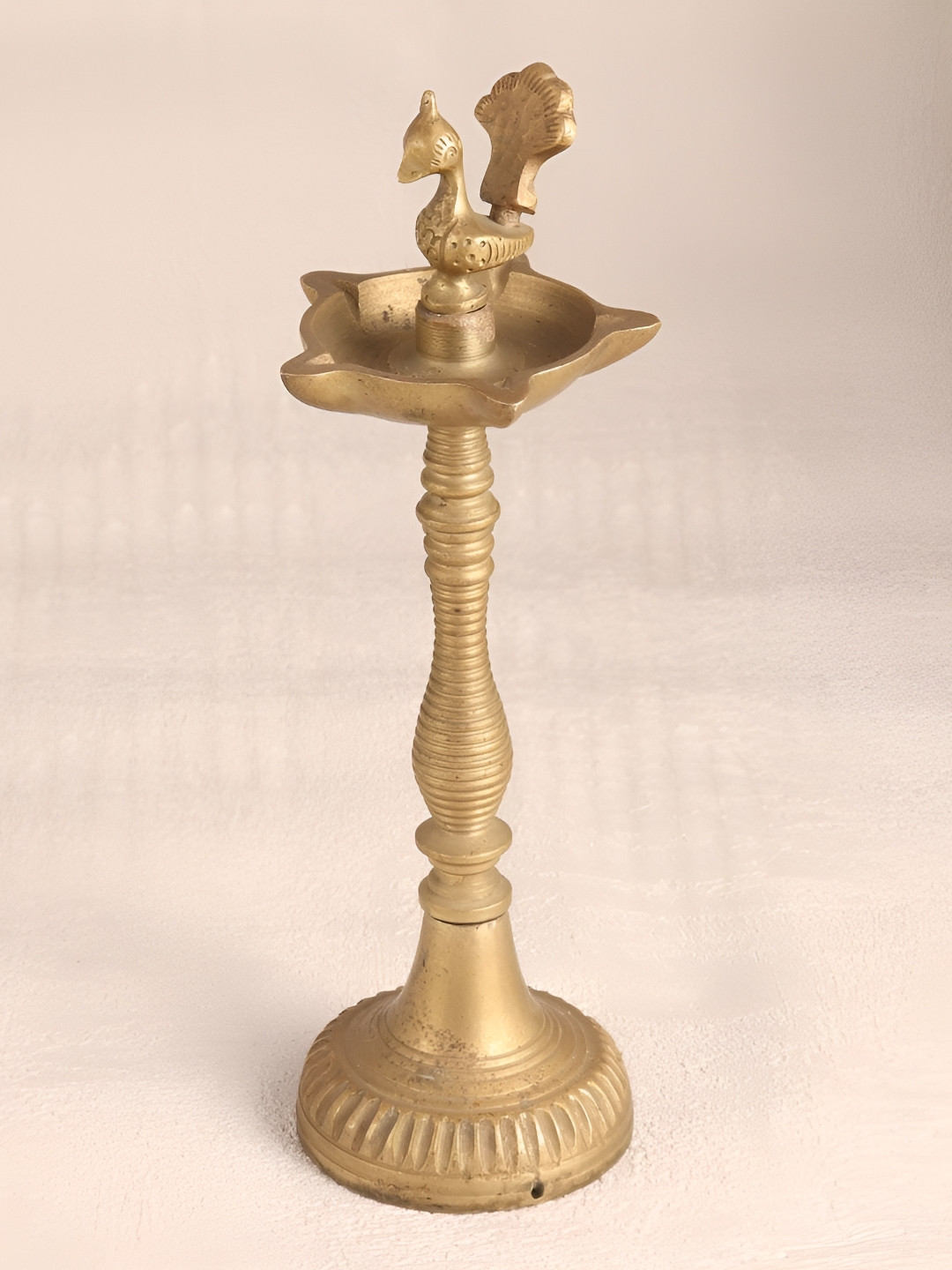 

Indianshelf Gold-Toned Brass Diwali Peacock Diya