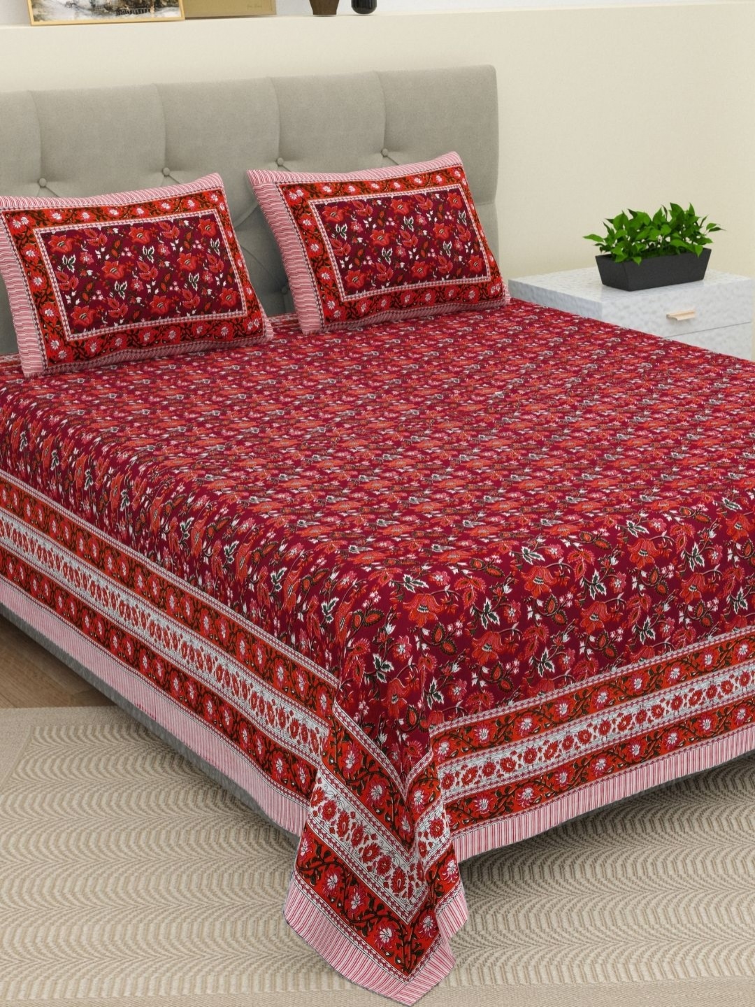 

The Craft Monk Maroon Floral Printed 210 TC Cotton King Bedsheet with 2 Pillow Covers