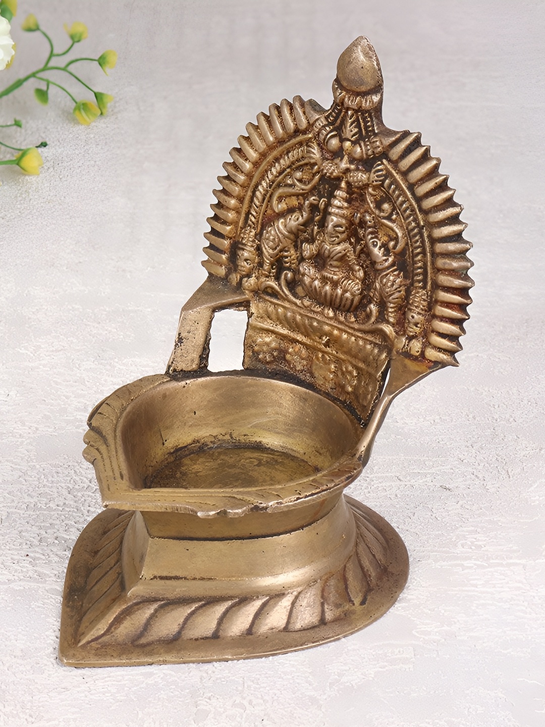 

Indianshelf Bronze Gajalakshmi Idol Textured Brass Diya