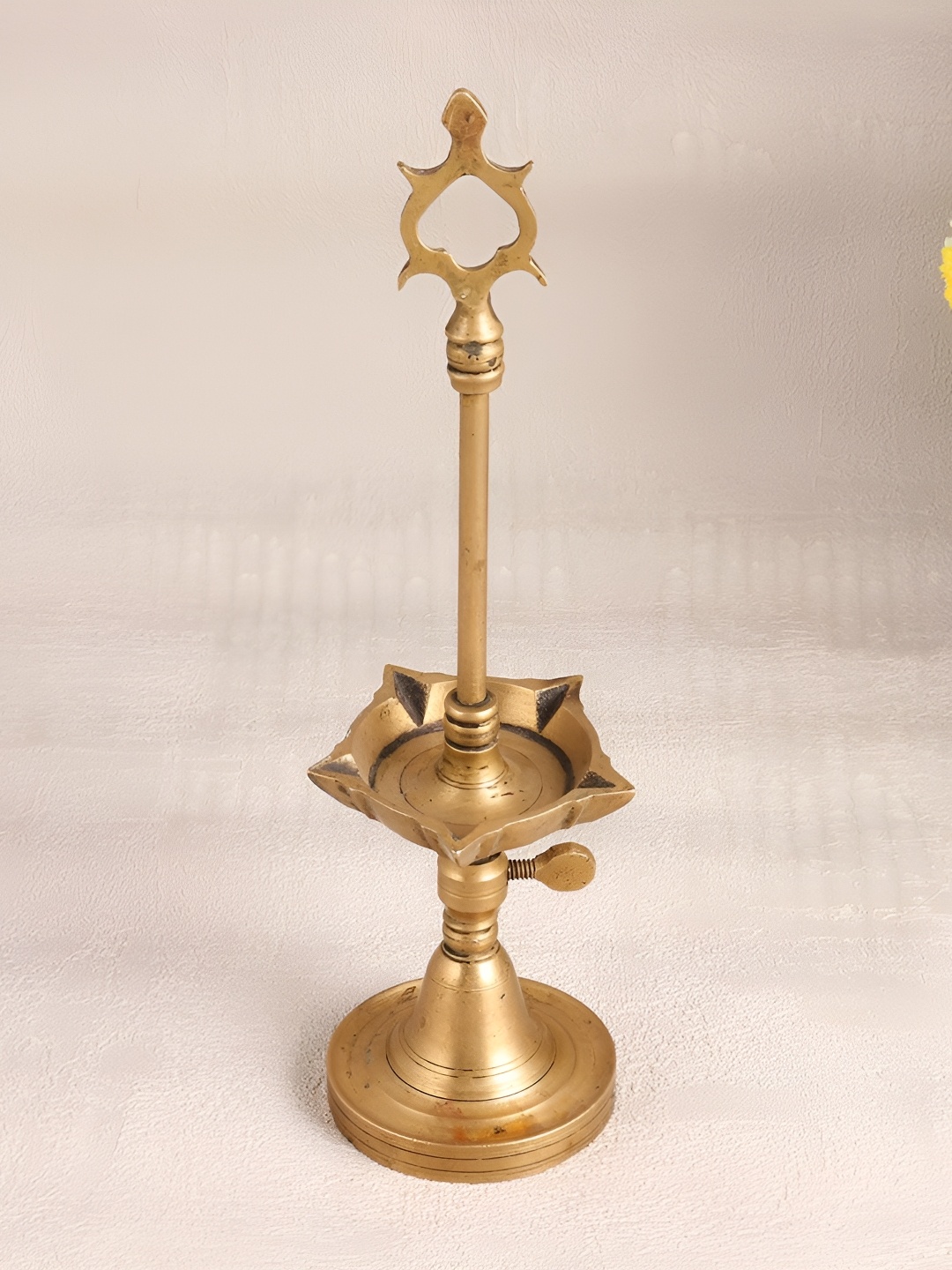 

Indianshelf Gold-Toned Textured Brass Diwali Standing Oil Diya