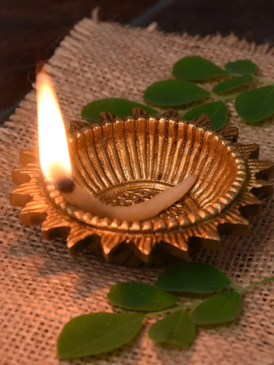 

Indianshelf Gold-Toned Textured Brass Sun Flower Design Deepak Diya