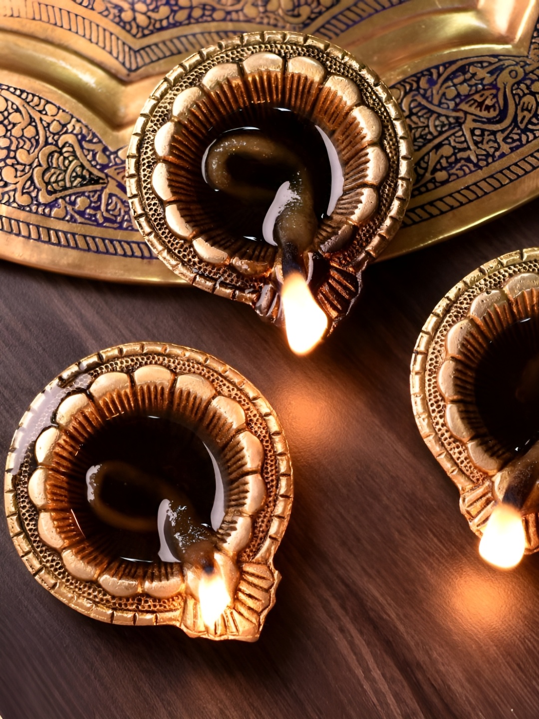 

Indianshelf Gold Toned 3 Pieces Textured Brass Oil Diya Pooja Essentials