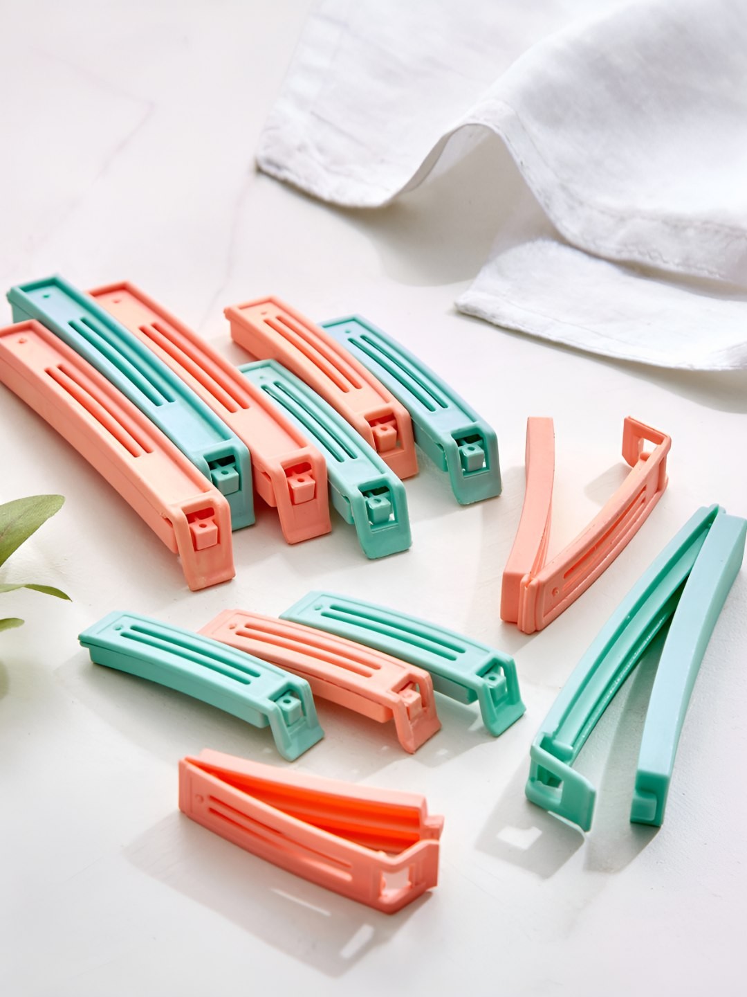 

Home Centre 12 Pcs Green & Peach Color Plastic Bag Clip