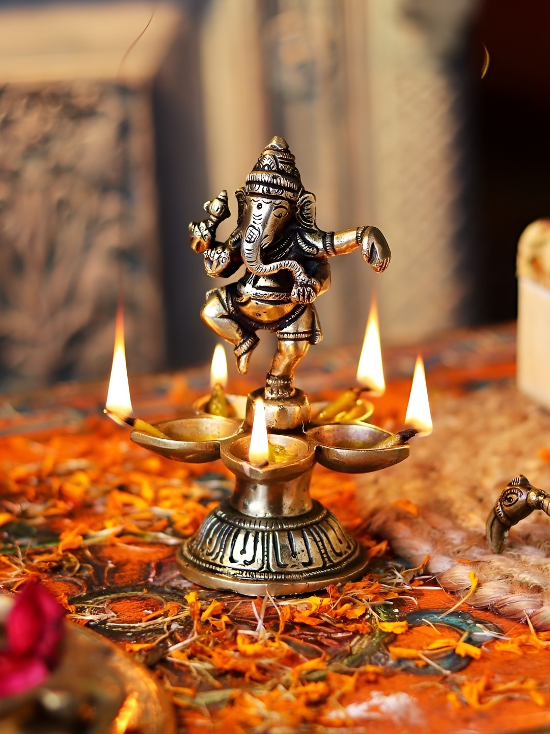 

Indianshelf Gold-Toned Textured Ganesha Brass Diya Pooja Essentials