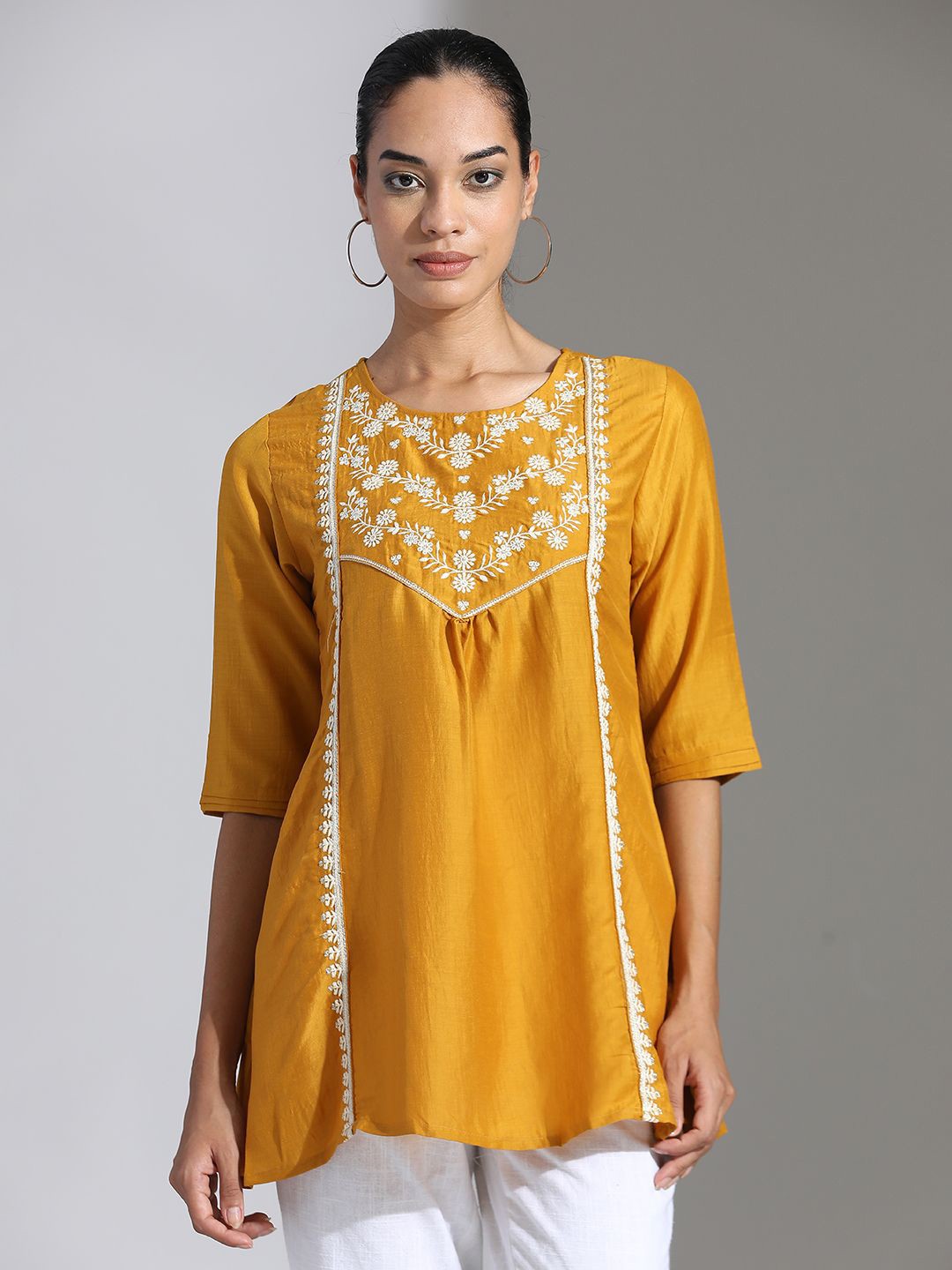 

Jaipur Kurti Women Floral Embroidered Round Neck Top, Mustard