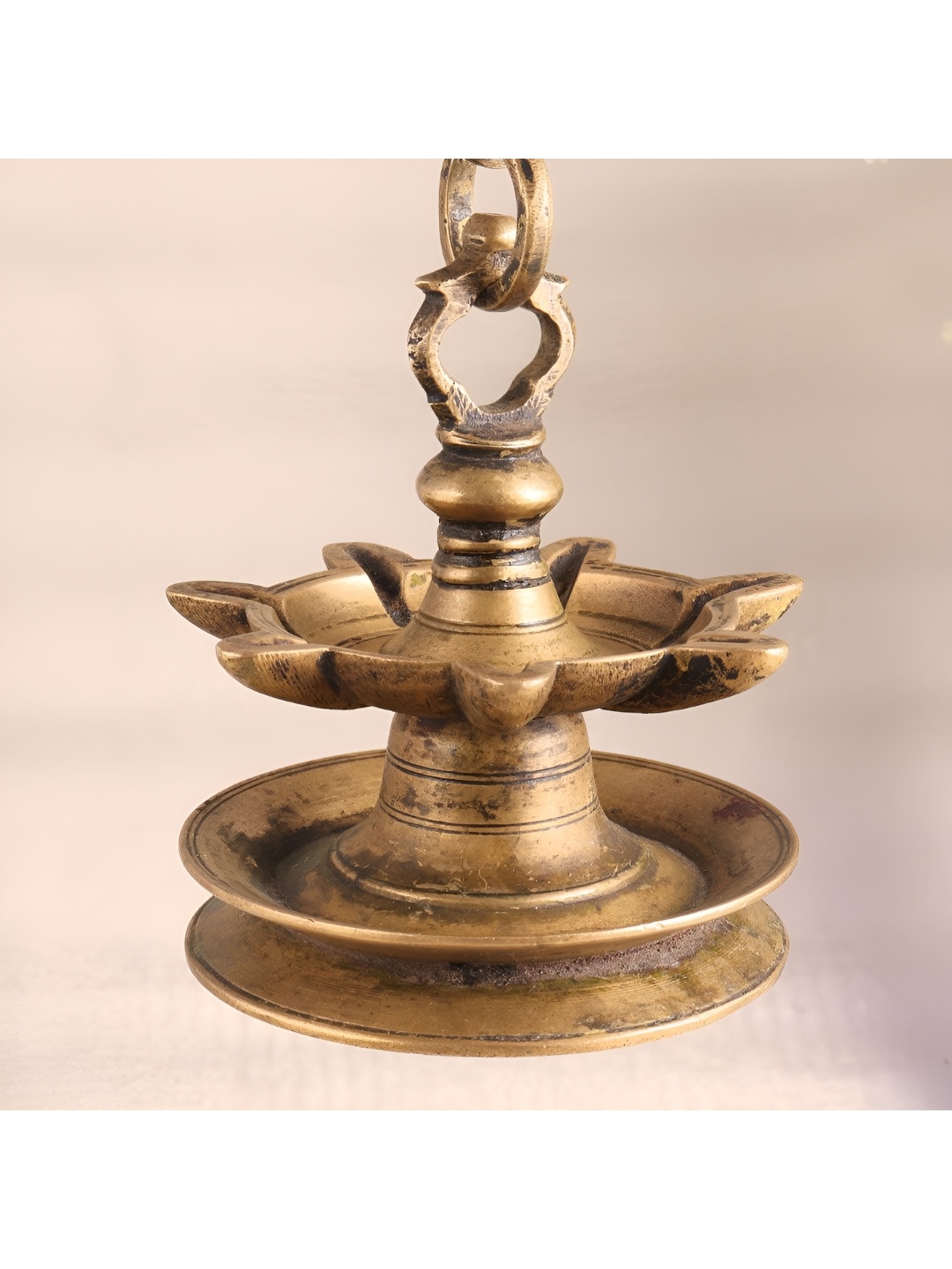 

Indianshelf Gold-Toned Textured Brass Hanging Diya Pooja Essentials