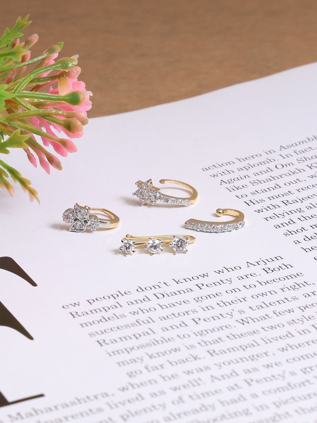 

Mali Fionna Set Of 4 Gold Plated American Diamond Studded Ring Nosepins