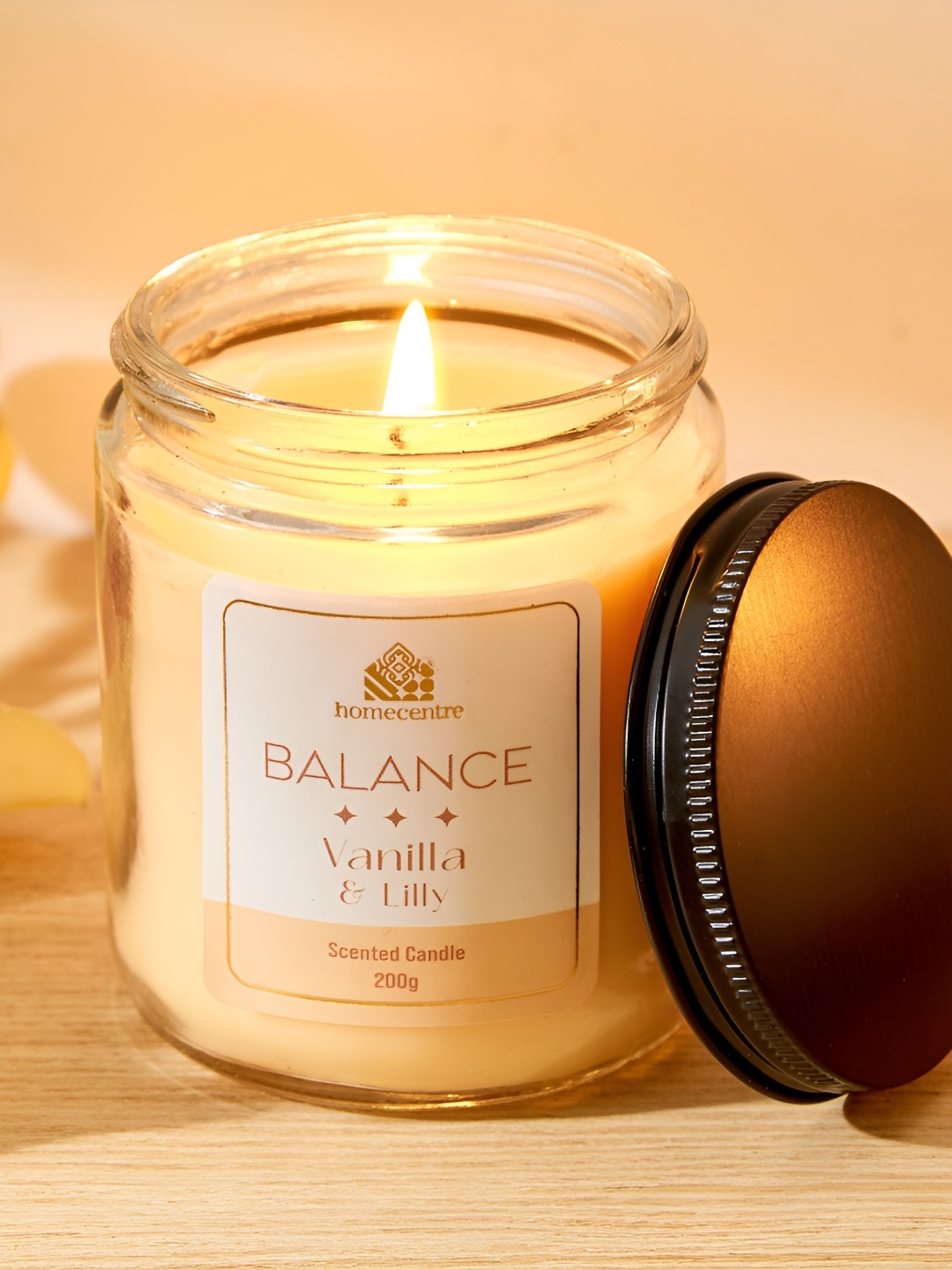 

Home Centre Adora Balance Off White and Black Vanilla and Lilly Scented Jar Candle