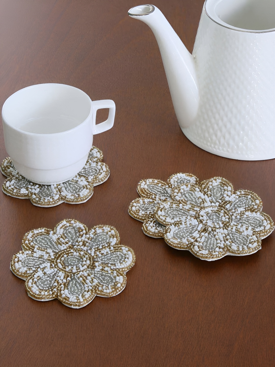 

Athome by Nilkamal Grey & Gold Toned 4 Pieces Embellished Floral Shaped Beaded Coasters