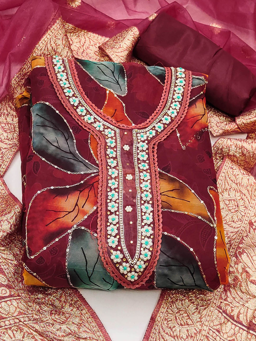 

Ishin Floral Embroidered Sequinned Organza Unstitched Dress Material, Magenta