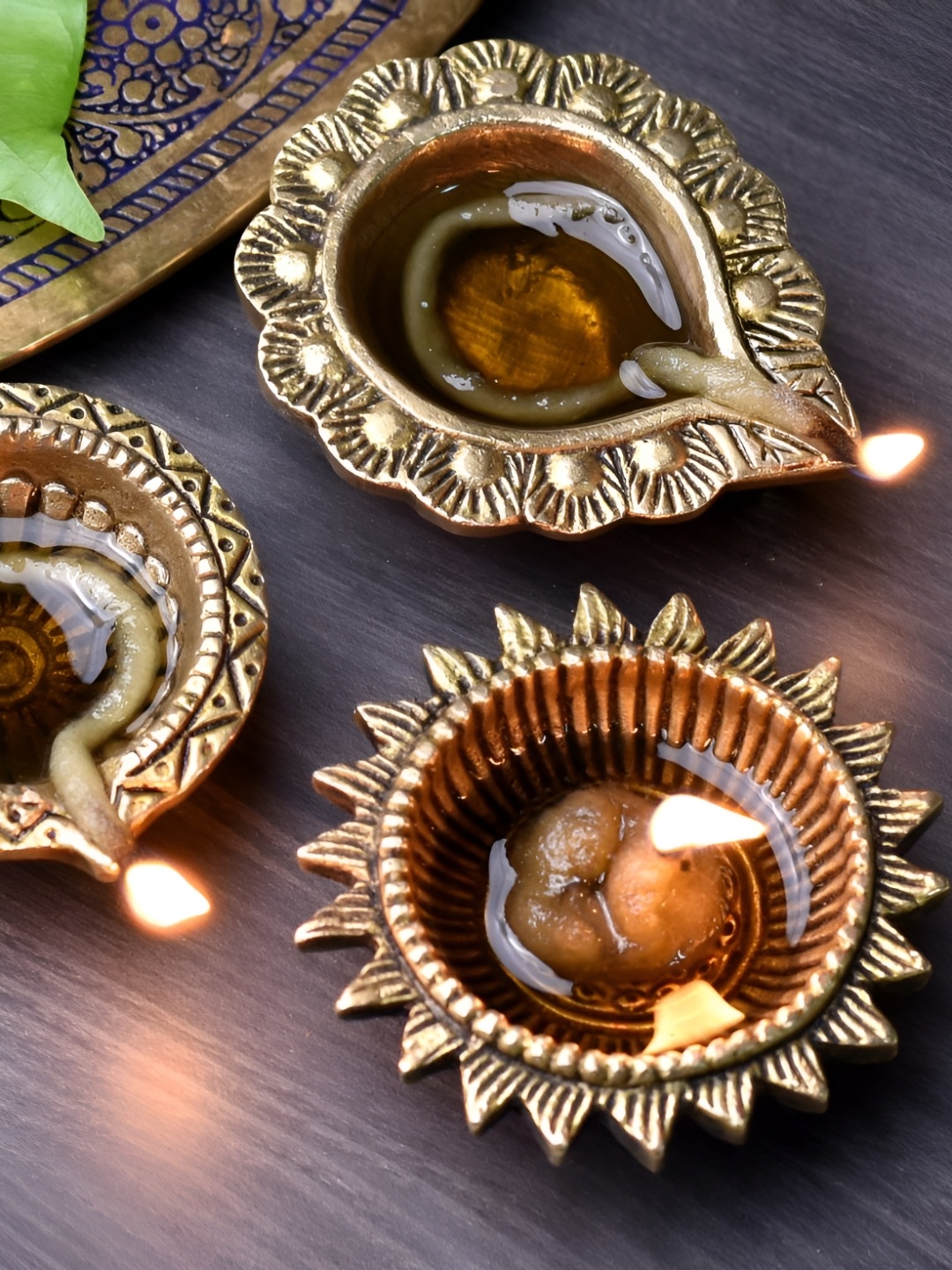 

Indianshelf Gold Toed 3 Pieces Textured Brass Pooja Diyas